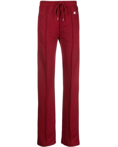 Courreges Pantalones de chándal con logo bordado - Rojo