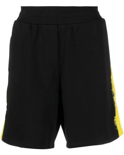 Moschino Pantalones cortos de deporte con fantasía estampada - Negro