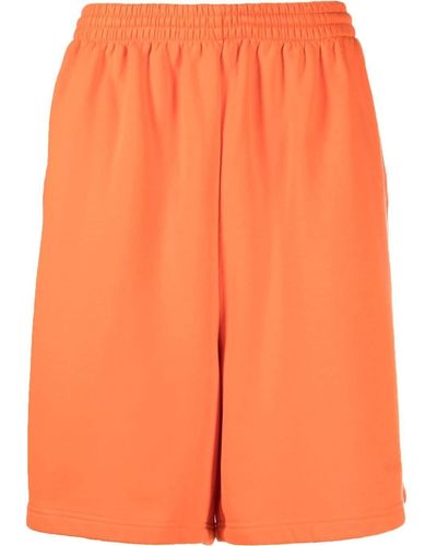 Balenciaga Pantalones cortos de chándal con logo bordado - Naranja