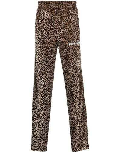Palm Angels Pantalones de chándal con motivo de leopardo - Gris