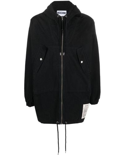 Moschino Manteau zippé à patch logo - Noir