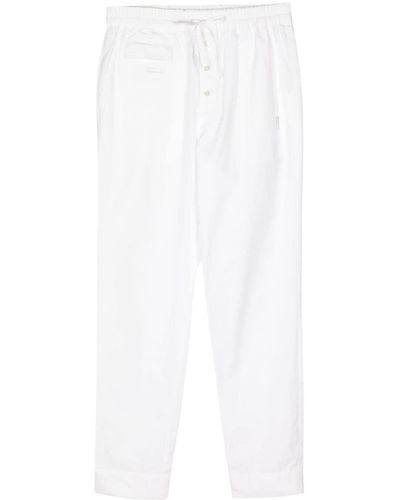 Undercover Pantalon de jogging en coton à empiècements - Blanc