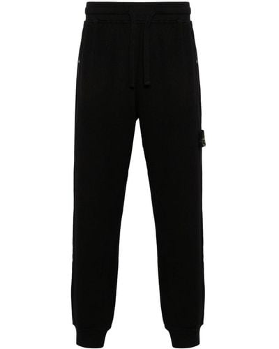 Stone Island Pantalones de chándal con distintivo Compass - Negro