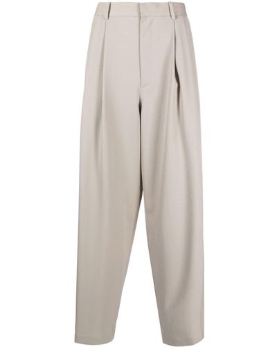 The Row Pantaloni a gamba ampia con pieghe - Bianco