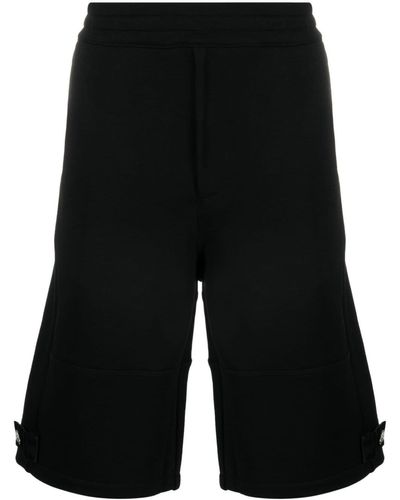 Alexander McQueen Shorts con placca logo - Nero