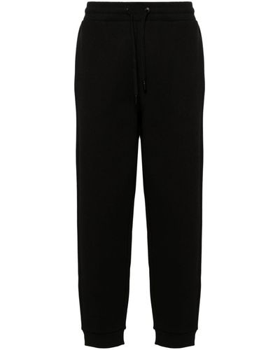 Ami Paris Pantalones de chándal con logo en relieve - Negro