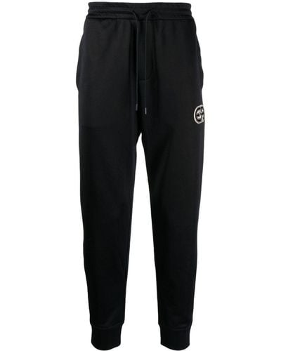 Emporio Armani Pantalon de jogging à patch logo - Noir