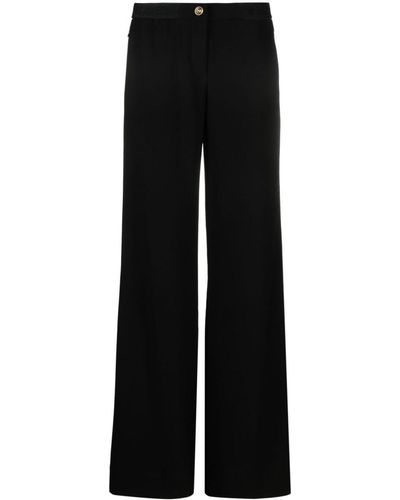 Versace Jeans Couture Pantalon ample à détail de logo - Noir