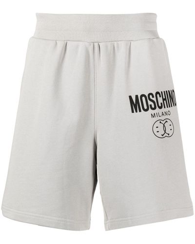 Moschino Short de sport à logo imprimé - Gris