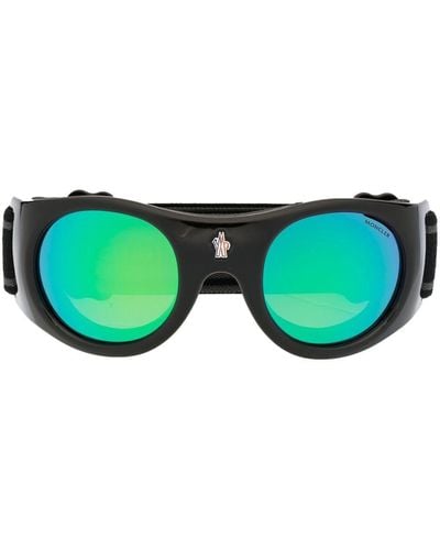 Moncler Sonnenbrille mit rundem Gestell - Grün