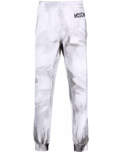 Moschino Pantalon de jogging à logo imprimé - Blanc