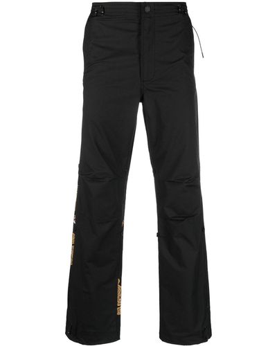 Maharishi Snopants Hose mit aufgesticktem Drachen - Schwarz