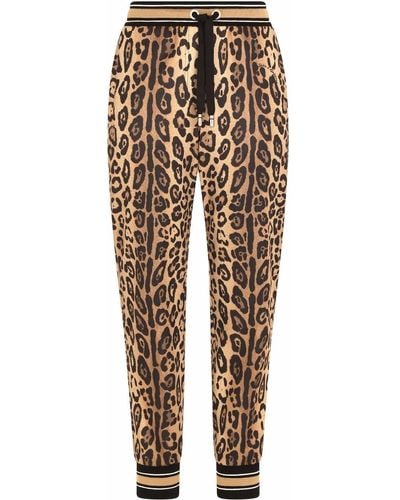 Dolce & Gabbana Pantalon de jogging à imprimé léopard - Marron