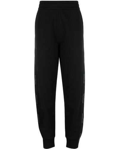Moncler Pantalones de chándal con ribete del logo - Negro
