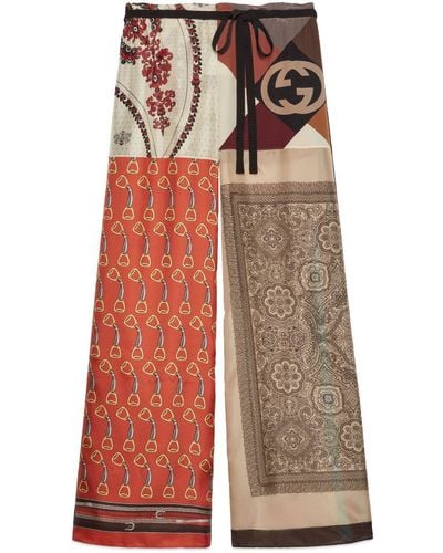 Gucci Pantalon en soie Heritage à imprimé patchwork - Rouge