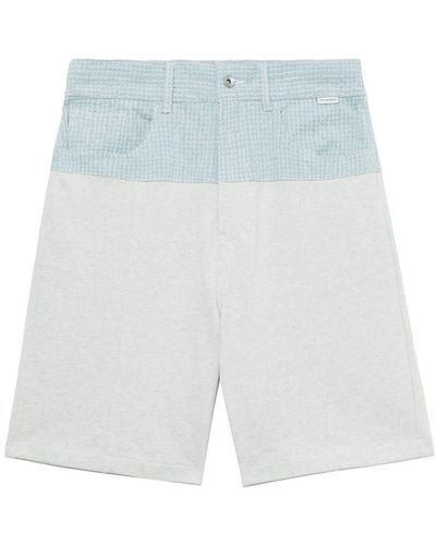 FIVE CM Wide-leg panelled shorts - Blau