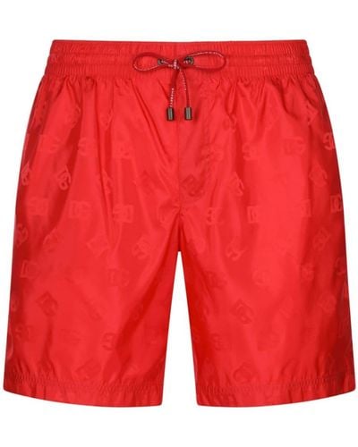 Dolce & Gabbana Short de bain à motif monogrammé - Rouge