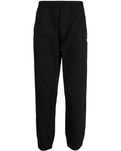 Chocoolate Pantalones de chándal con parche del logo - Negro