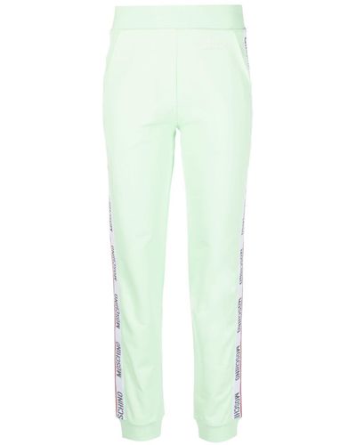 Moschino Embossed-logo Jersey Trousers - Green