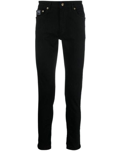 Versace Jeans Couture Pantalon en coton à patch logo - Noir