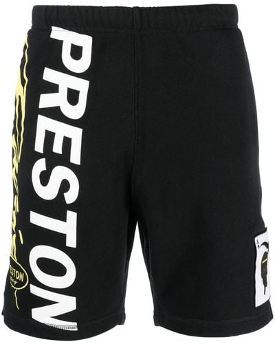 Heron Preston Pantalones cortos de chándal con logo - Negro