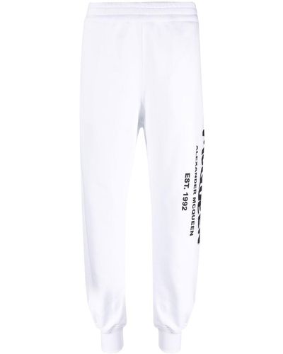 Alexander McQueen Pantalones de chándal ajustados con logo - Blanco