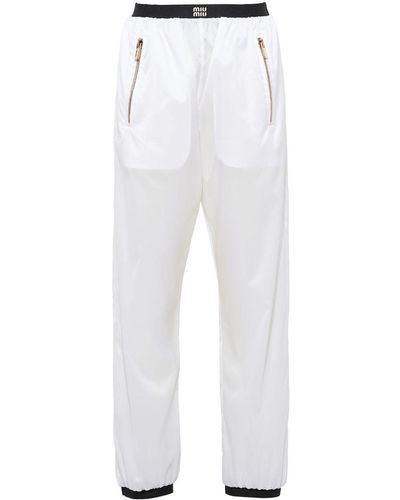 Miu Miu Pantalon de jogging à logo imprimé - Blanc