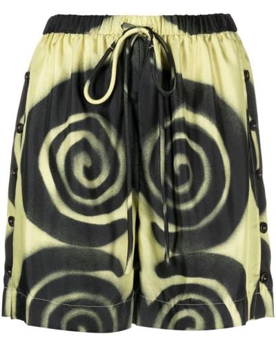 Nanushka Amil Shorts aus Seide mit Spiral-Print - Grün