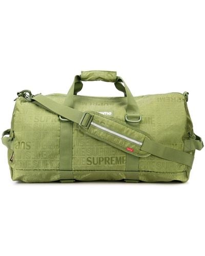 Supreme logo-print Duffle Bag - Farfetch
