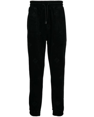 HUGO Pantalones de chándal con logo estampado - Negro