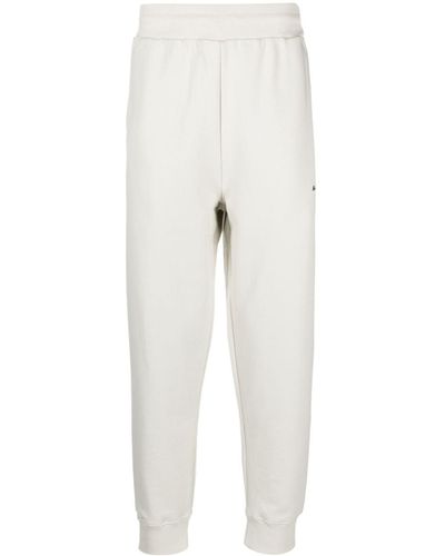A_COLD_WALL* Pantalones de chándal con logo estampado - Blanco