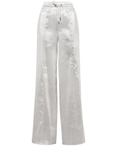 Brunello Cucinelli Pantalones anchos metalizados - Blanco