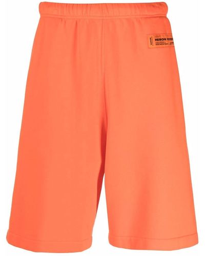 Heron Preston Pantalones cortos de chándal con parche del logo - Naranja