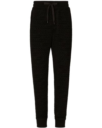 Dolce & Gabbana Pantalon de jogging en coton à logo imprimé - Noir