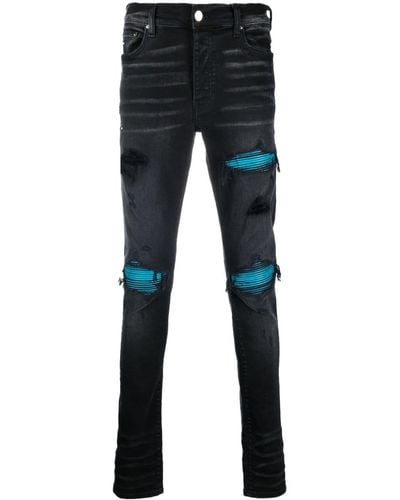 Amiri Jeans skinny con effetto vissuto - Nero