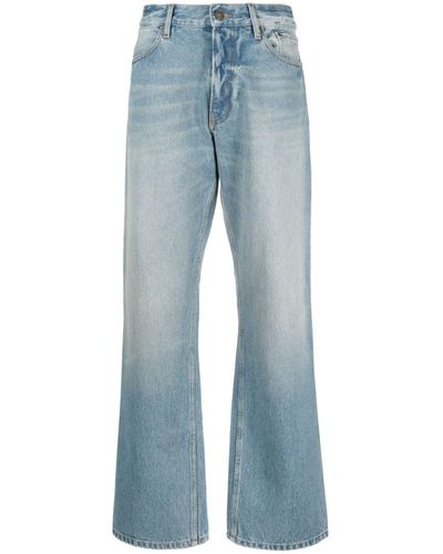 Gauchère Low-rise Wide-leg Jeans - Blue
