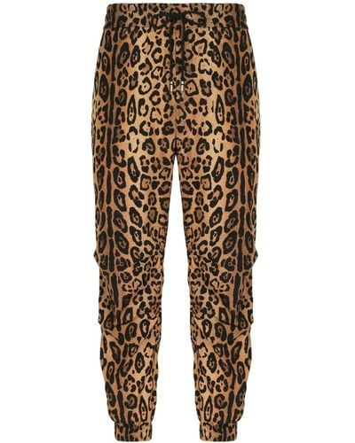 Dolce & Gabbana Pantalon de jogging à imprimé léopard - Marron