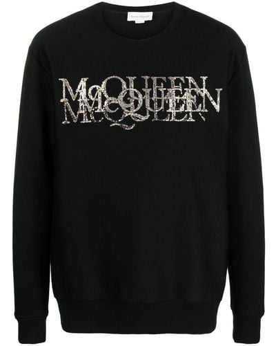 Alexander McQueen Pull à logo strassé - Noir