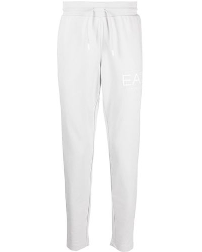 EA7 Pantalon de jogging fuselé à logo imprimé - Blanc