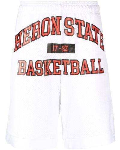 Heron Preston Pantalones cortos de deporte con logo estampado - Rojo