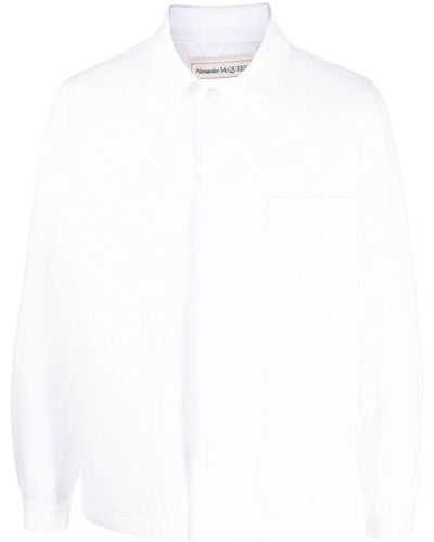 Alexander McQueen Veste en jean à logo brodé - Blanc