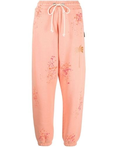 Palm Angels Pantalones de chándal PXP con manchas de pintura - Rosa
