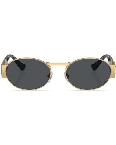 Versace Eyewear Lunettes de soleil à monture rondes à logo - Métallisé