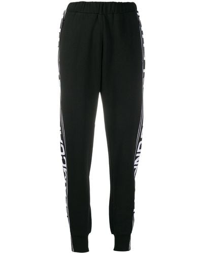 Stella McCartney Pantalon de jogging à bandes logo - Noir