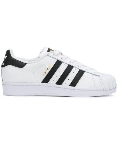adidas Superstar "white/black/gold" Trainers