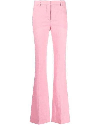 Versace オールオーバーロゴ フレアパンツ - ピンク