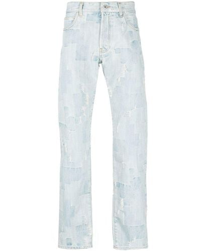 Marcelo Burlon Patchwork-design Ripped-detail Jeans - Blue