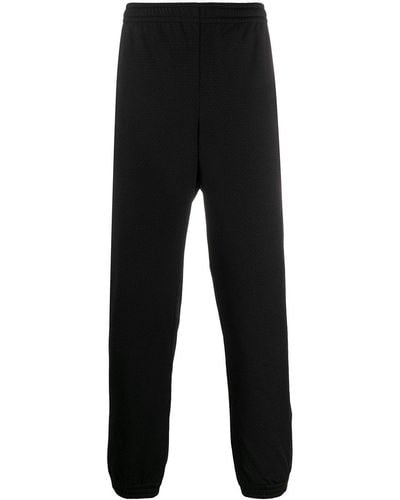 Gucci Logo stitched tailored trousers - Negro
