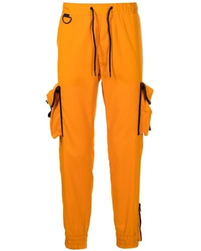 BOSS Pantaloni sportivi con bordo a contrasto x Khaby - Arancione