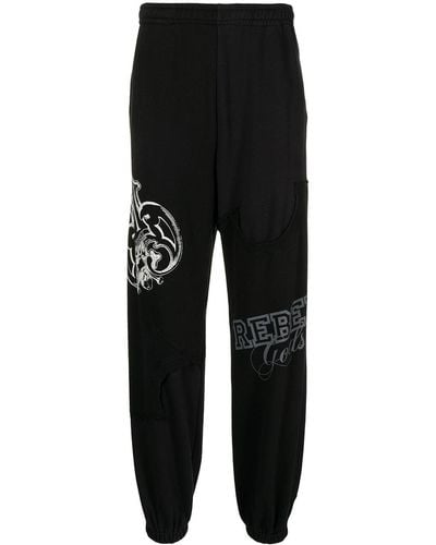 Undercoverism Graphic-print Track Trousers - Black